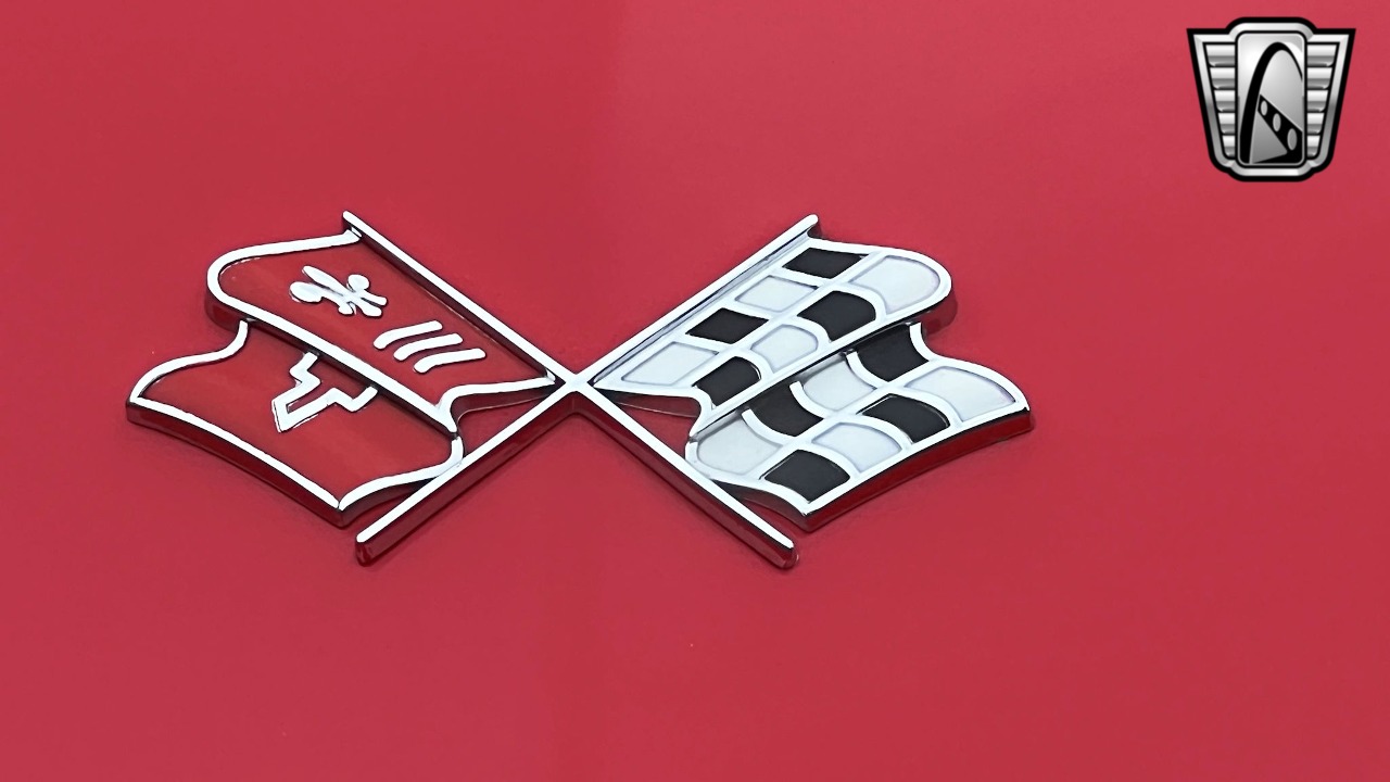 A close-up of a car emblem

Description automatically generated